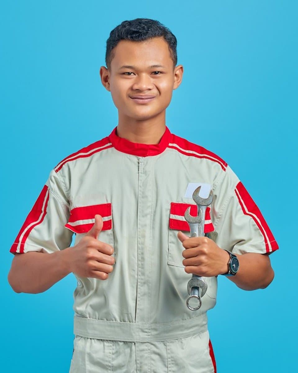 Verified AC technician servicing a unit in Dhaka